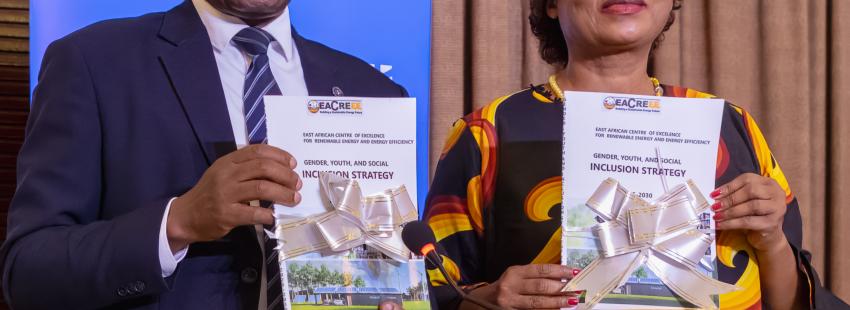 Executive Director of EACREEE, Canon Goddy Muhanguzi and UN Women Country Rep, Dr. Paulina Chiwangu officially launch the Strategy. (Photo ©️ Alan Sherrard)