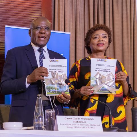 Executive Director of EACREEE, Canon Goddy Muhanguzi and UN Women Country Rep, Dr. Paulina Chiwangu officially launch the Strategy. (Photo ©️ Alan Sherrard)